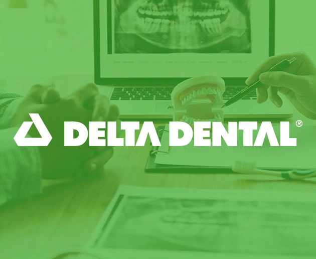 Delta Dental logo displayed over green-tinted dental office setting with equipment and computer monitor.