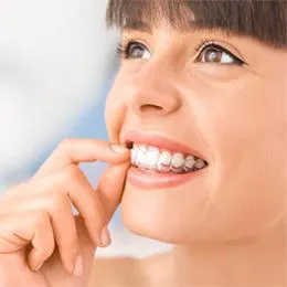 Young woman with healthy smile flossing teeth, dental care hygiene practice