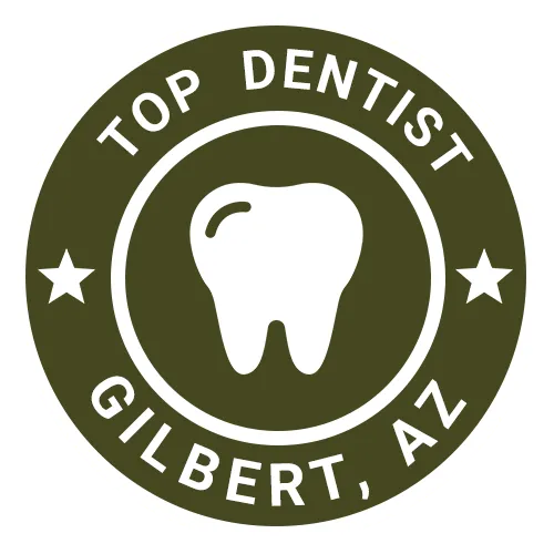 Top Dentist badge for Gilbert, AZ dental practice featuring tooth icon with stars